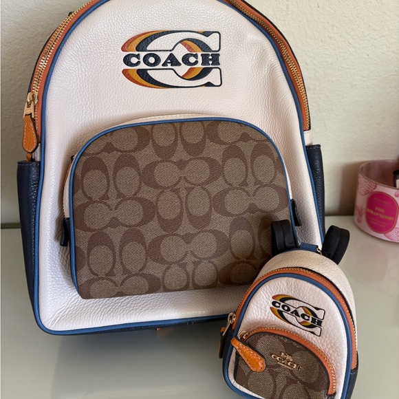Coach Handbags - COACH Signature Mini Backpack in White and Brown with mini backpack accessory !